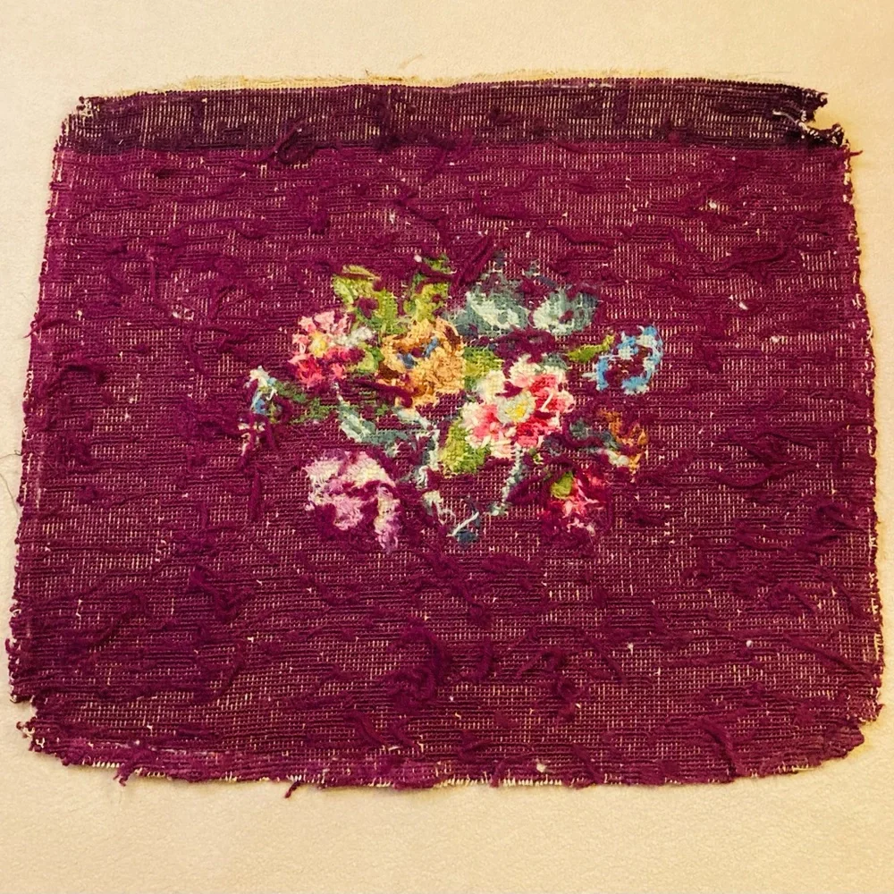 Beautiful vintage finished embroidery on burgundy wool, in fanciful floral’s
